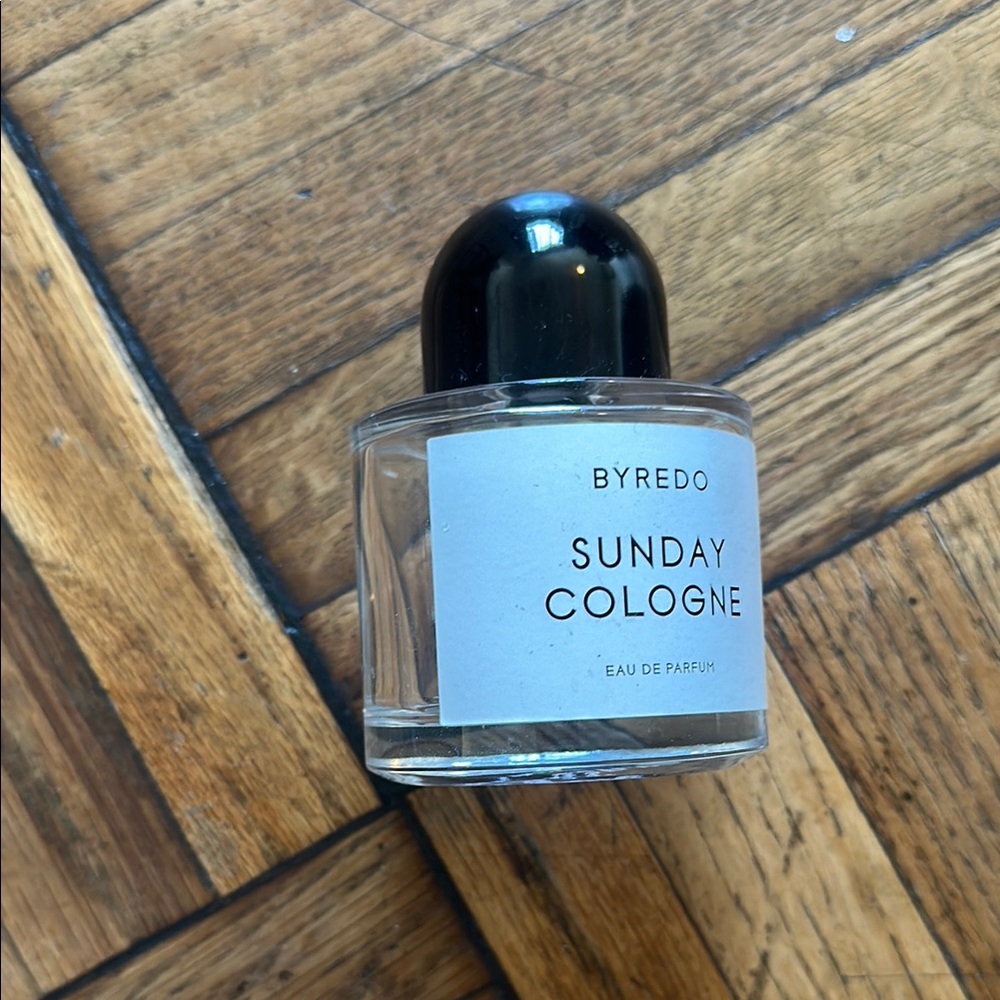Empty Byredo Sunday Cologne with Black Cap